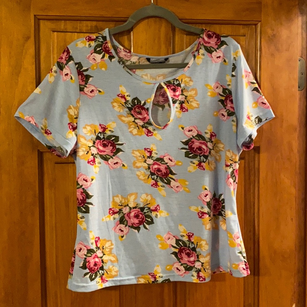 Blue floral peekaboo knit top